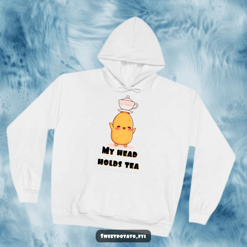 Funny hoodie showing a sweet potato character precariously balancing a miniature teacup on its head, designed for humorous comfort.