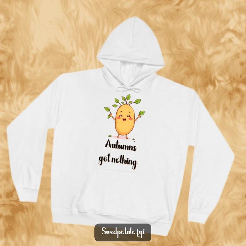 Funny hoodie featuring a happy sweet potato character juggling leaves, perfect for adding a touch of humor to casual wear.