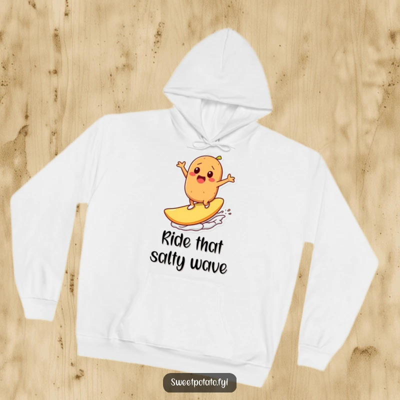 Funny hoodie: A sweet potato character exhilaratedly surfs atop a gigantic potato chip, capturing the essence of extreme snack enjoyment.