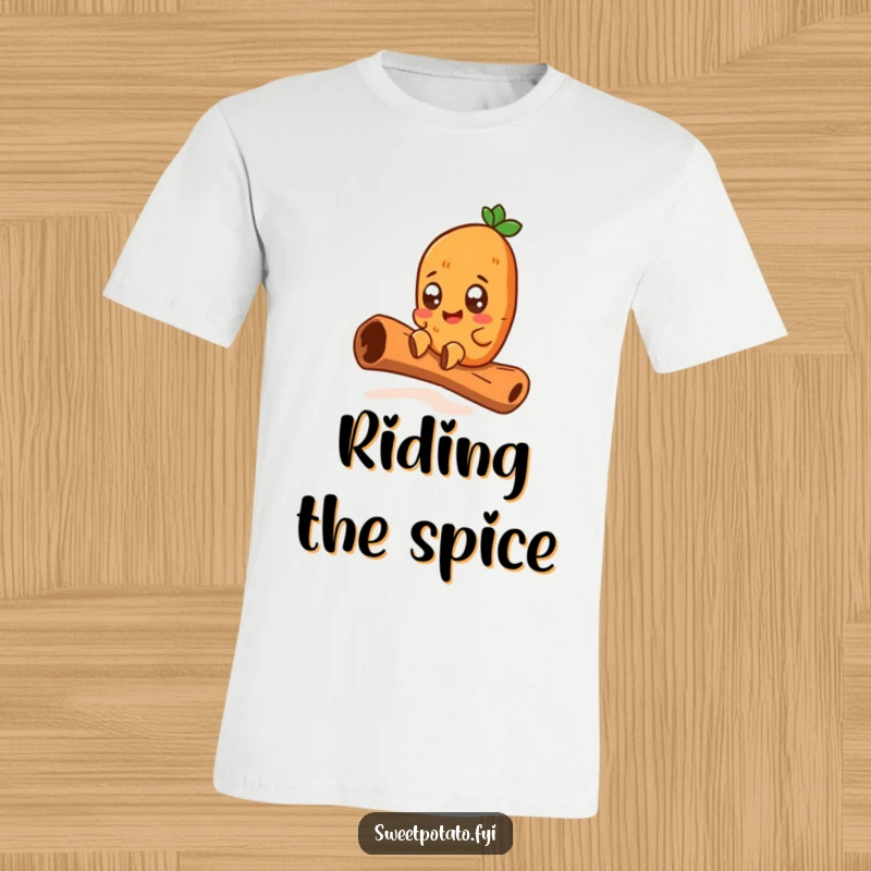Funny t-shirt featuring a wide-eyed sweet potato character gleefully sliding down a massive cinnamon stick, radiating pure excitement and humor.